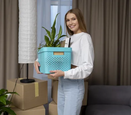 women moving in in new apartment